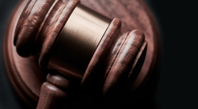 a-brown-and-gold-judges-gavel.png