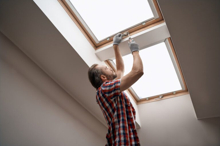 a-contractor-fixes-the-hinges-on-a-skylight-768x512.png