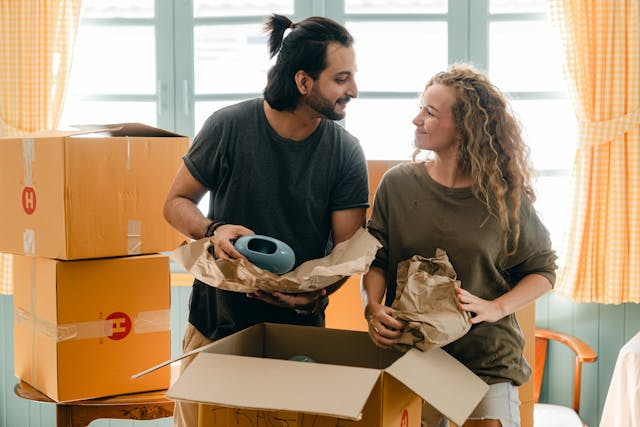 a-couple-unpacking-moving-boxes.png