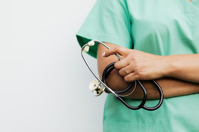 a-healthcare-professional-holding-a-stethoscope.png