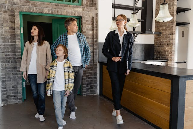 a-landlord-giving-a-property-tour-to-a-family-of-three.png